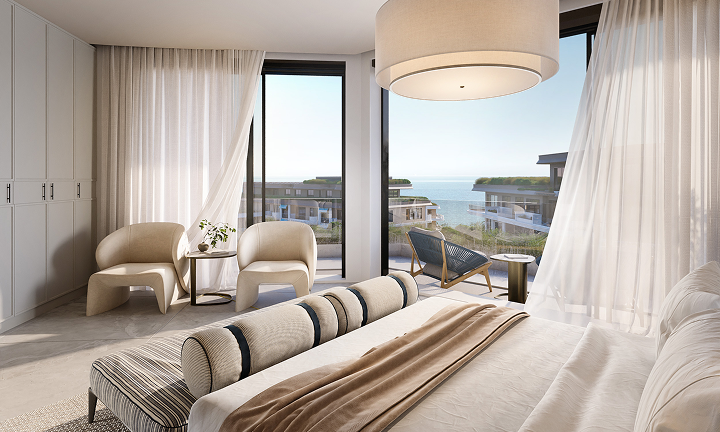 Bedroom with a balcony overlooking the sea