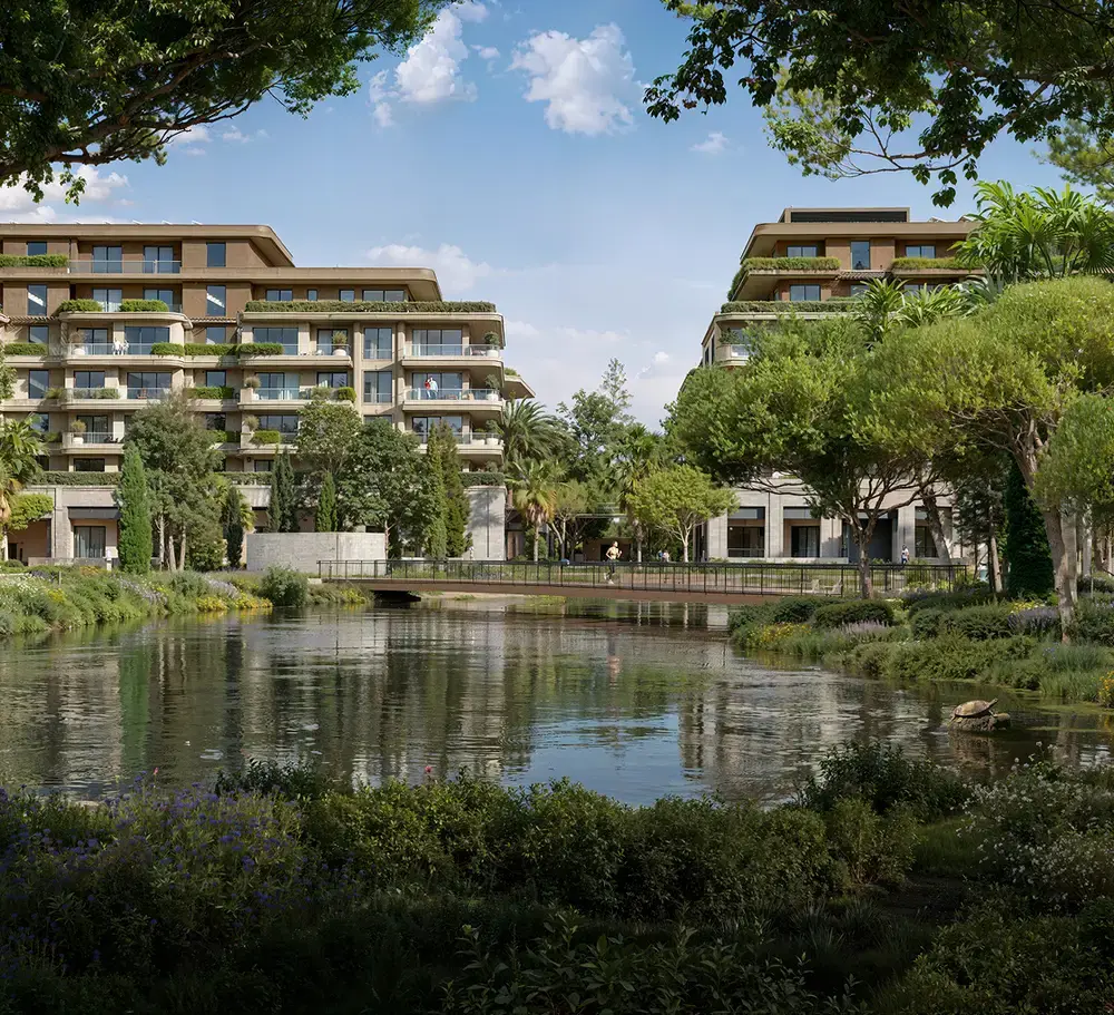 Porta Rai residences overlooking a tree-lined lake