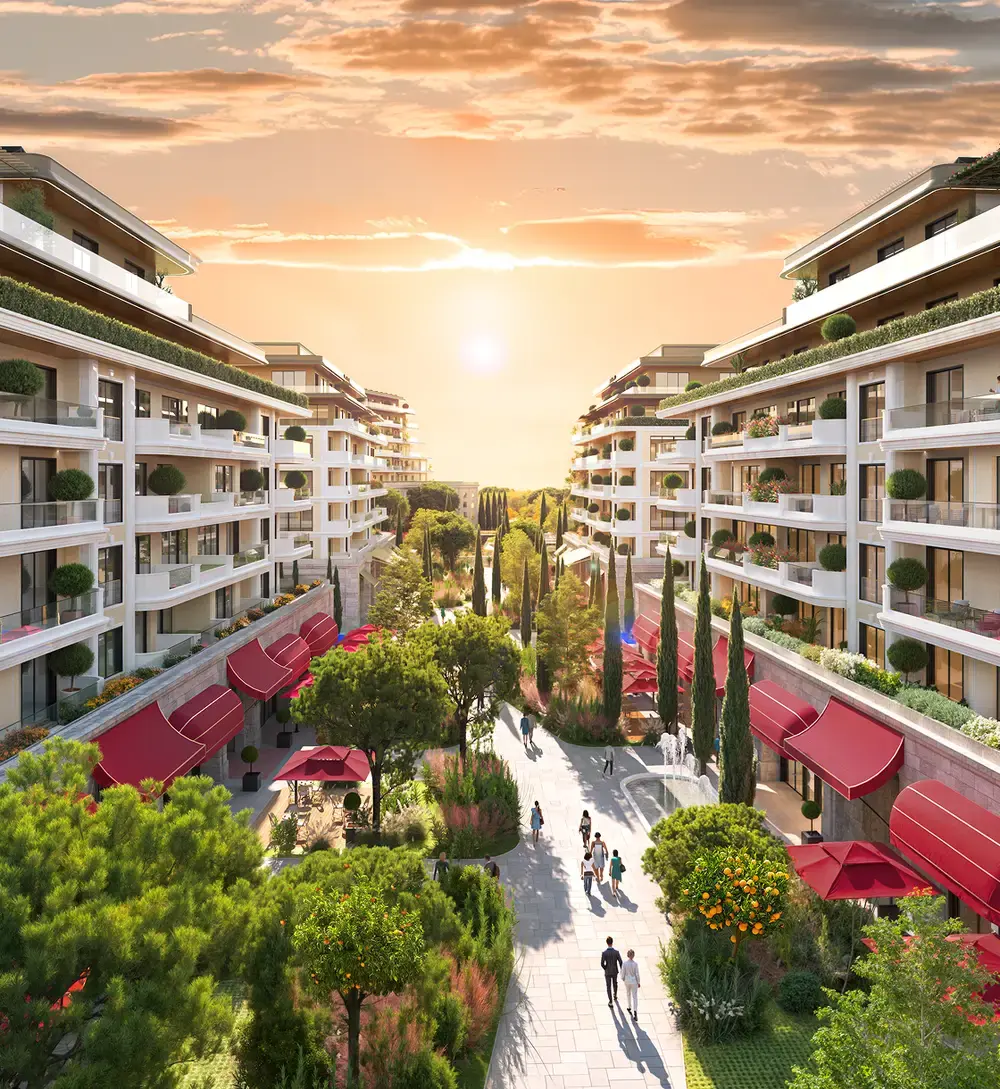 Porta Rai residences around a garden promenade at sunset